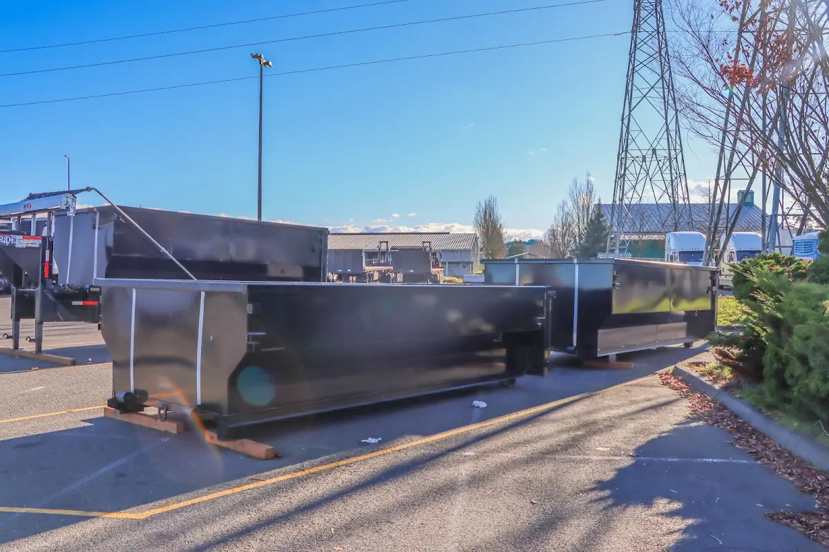 Roll-off dumpster ready for waste disposal at job site for Roofing Dumpster Rental in Clayton